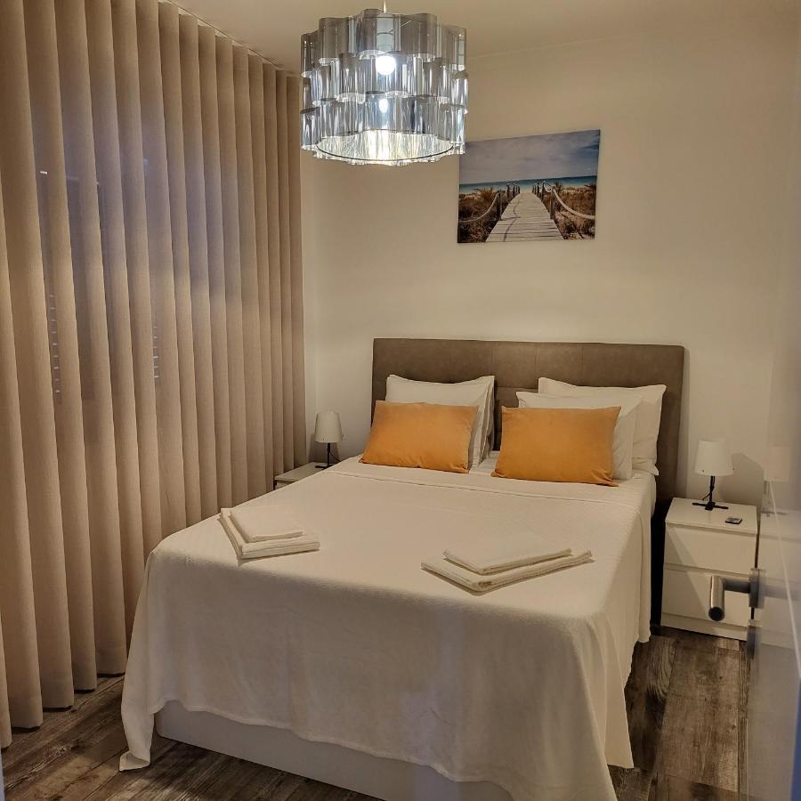 Nandos Apartement Costa da Caparica Bagian luar foto